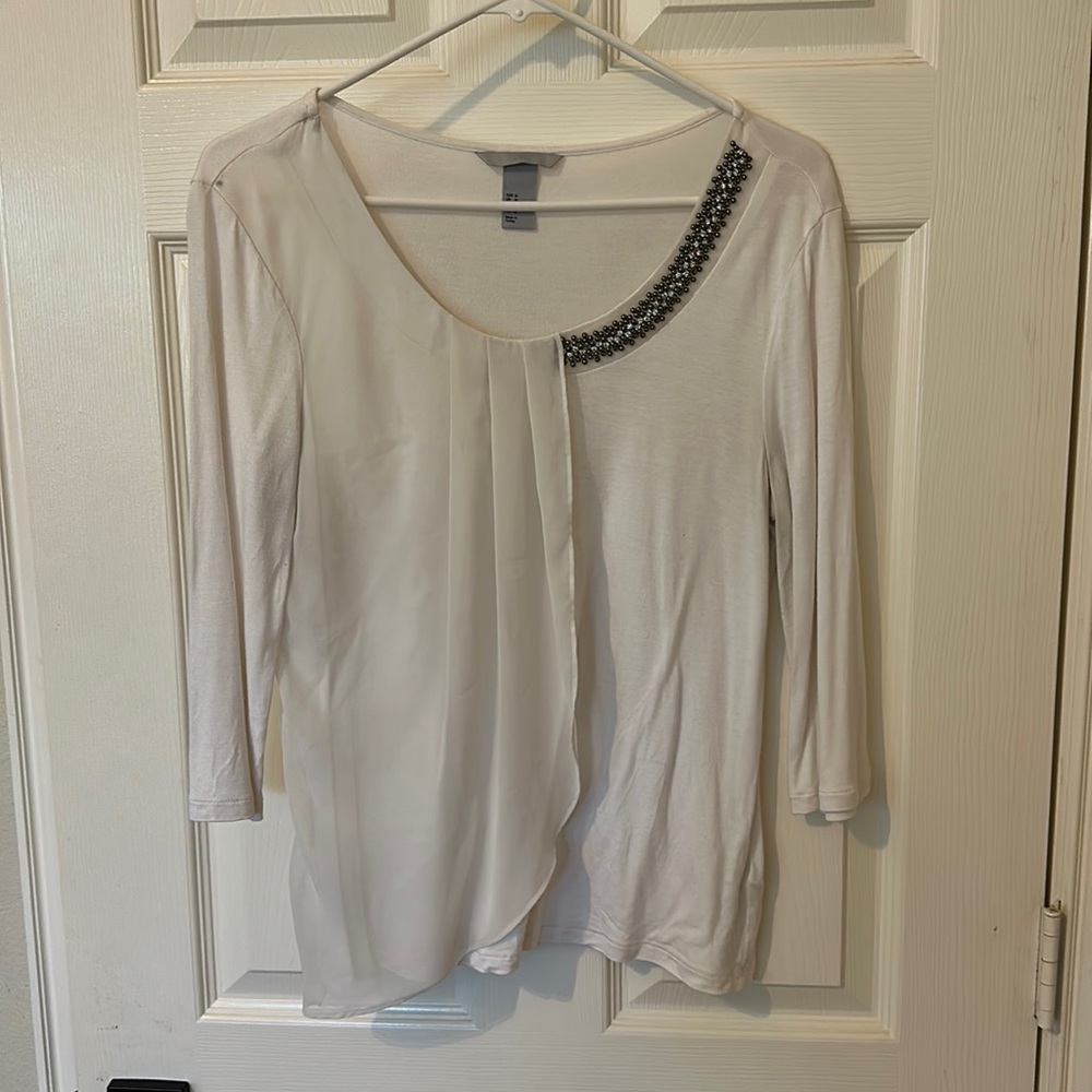 Embellished white blouse